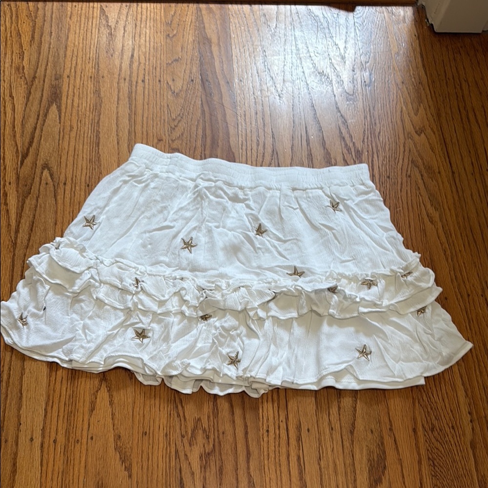 Storia White Bubble Mini Skirt with Ruffled Embellishments
